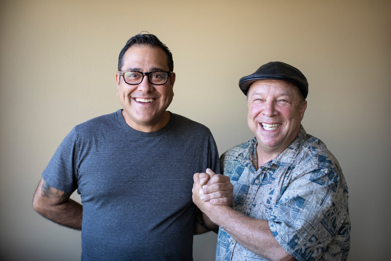 Tommy Russo, founder of MauiTimes, and J. Sam Weiss, the new publisher/executive editor, celebrate their new partnership and the re-launch of the publication.